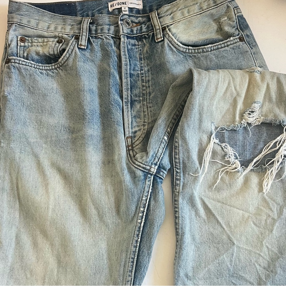 Redone 90s straight leg with raw hem and knee rip